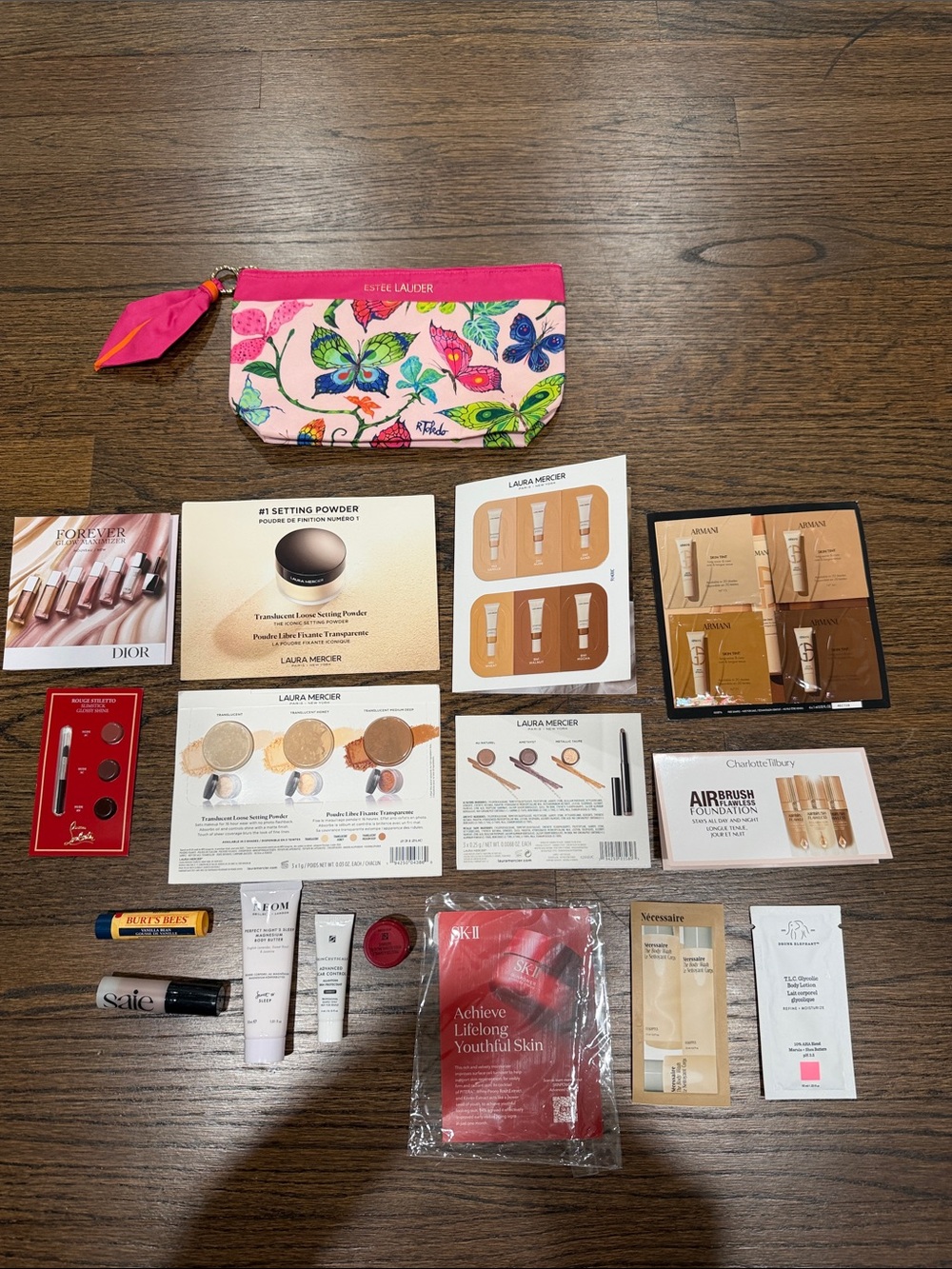 Estée Lauder cosmetic pouch and designer sample bundle